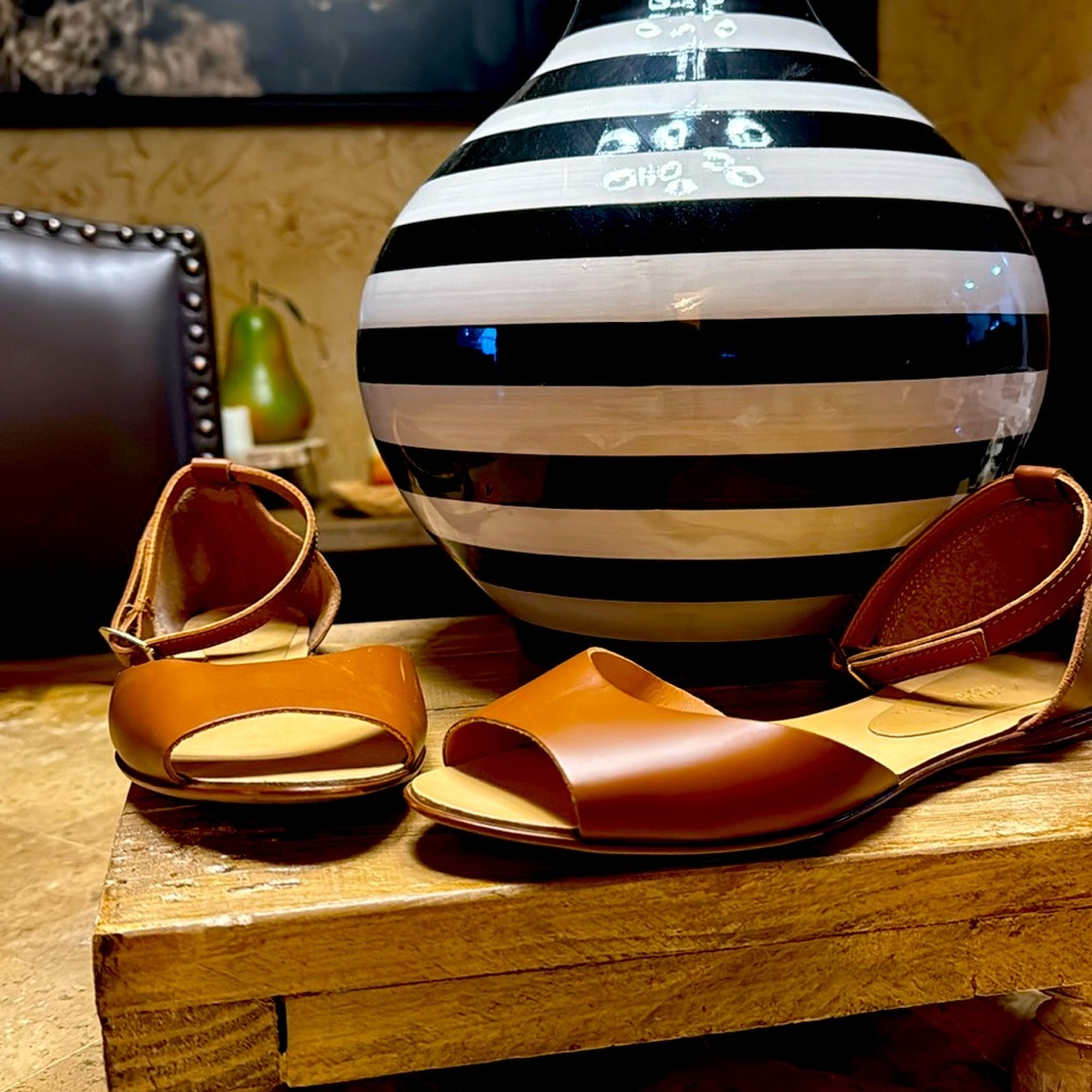 Ankle wrap around flat sandal in brown by A. Giannetti